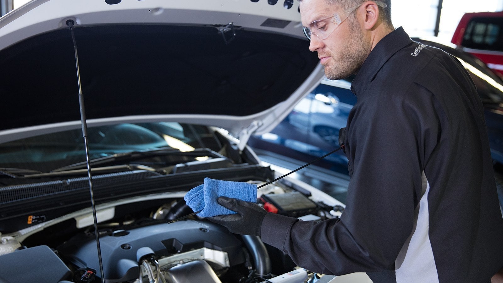 Service employee working on car
