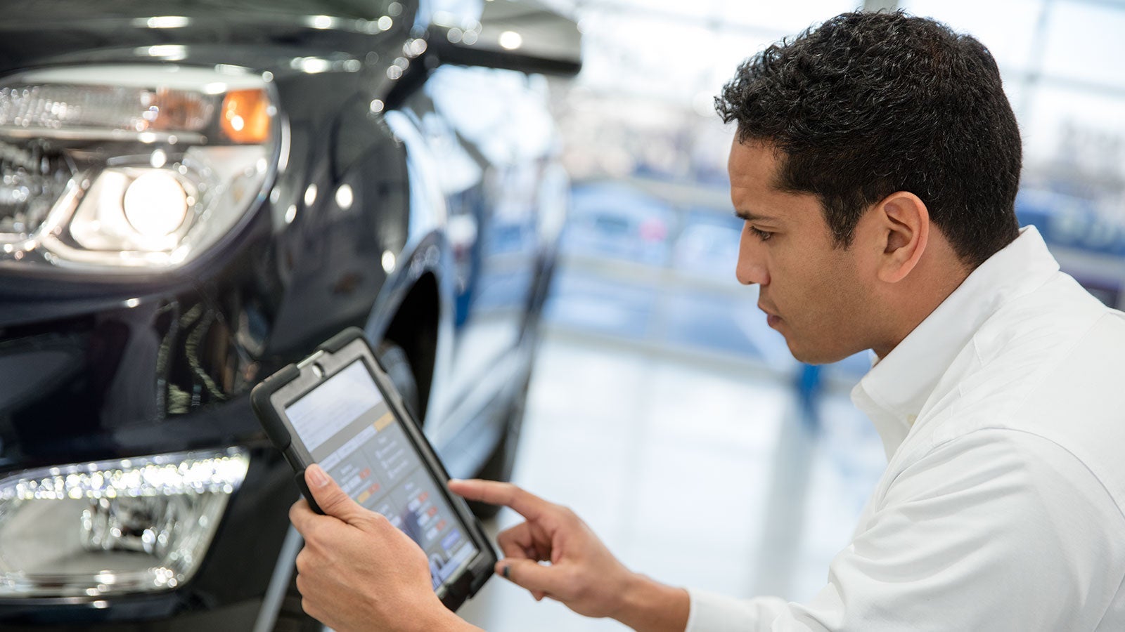 Technician looking at a tablet