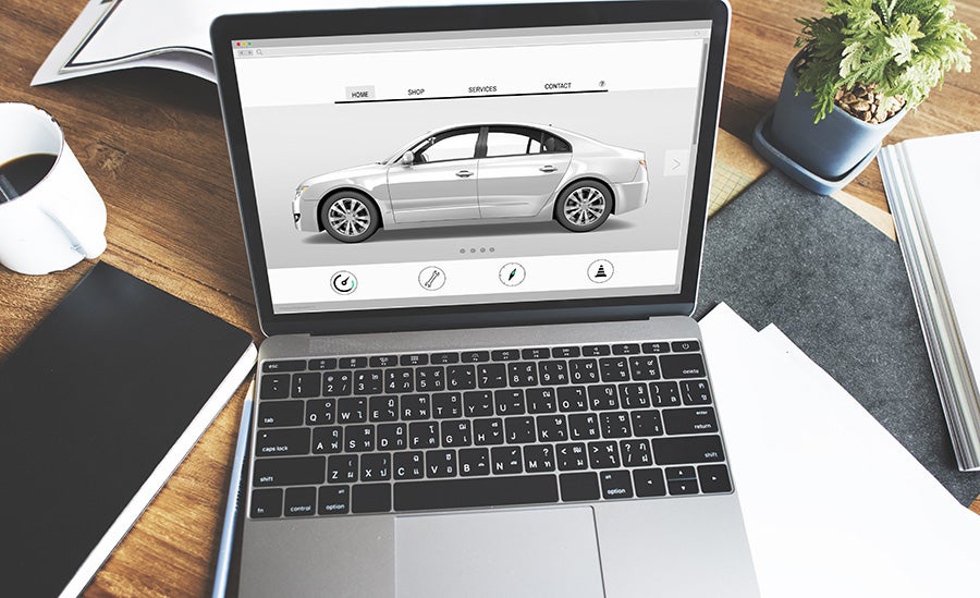 Laptop with car on the screen